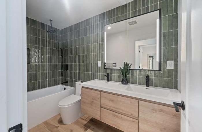 Modern green tile bathroom